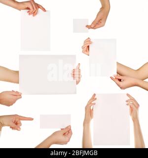 Hands holding blank cards isolated on white Stock Photo