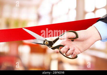 Grand opening, cutting red ribbon Stock Photo