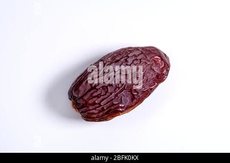 Dried dates fruit isolated on white Stock Photo