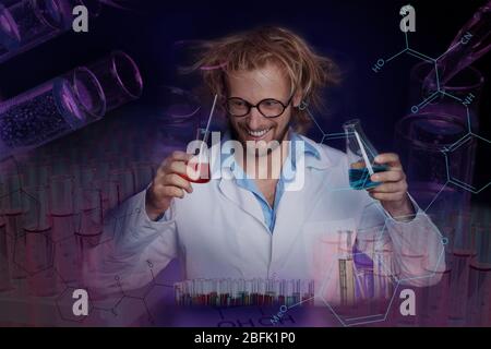 Crazy scientist working in laboratory Stock Photo