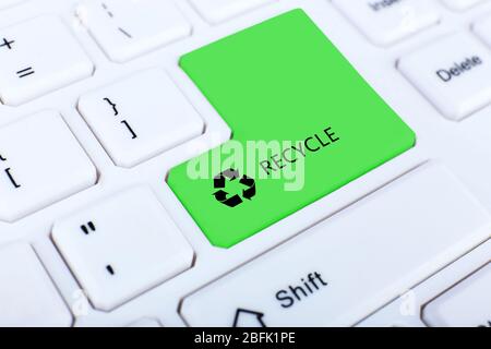Recycle concept, close up of keyboard, recycle button Stock Photo