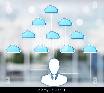 Businessman silhouette with clouds on bright background Stock Photo