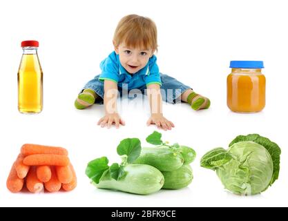 Cute baby boy and products for feeding isolated on white Stock Photo