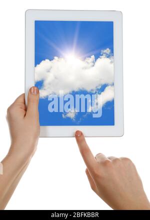 Hands holding tablet PC with sky in screen. Cloud computing concept Stock Photo