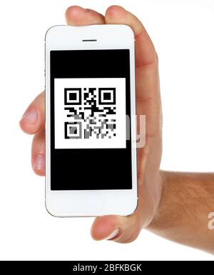 Hand holding smart phone with QR code on screen Stock Photo