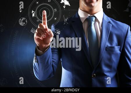 Businessman hand pushing business graph.  Futuristic button Stock Photo