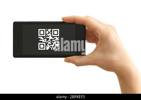 Hand holding smart phone with QR code on screen Stock Photo