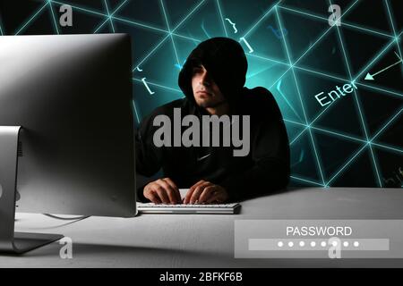 Hacker working with computer Stock Photo