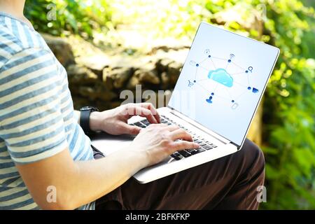 Man working with  cloud computing diagram, modern technology concept Stock Photo