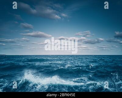 Waves amd sea ripple water with blue clody sky Stock Photo