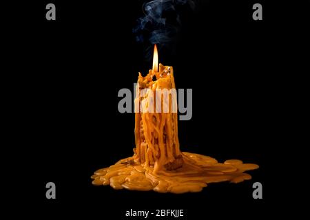 light flame candle burning brightly on black background Stock Photo