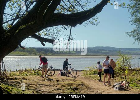 Bowling, Glasgow, Scotland, UK,18h April, 2020: UK Weather: Sunny day saw a busy Forth and Clyde canal at bowling on the firth of river clyde estuary. Stock Photo