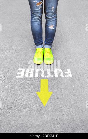 Female feet on road background Stock Photo