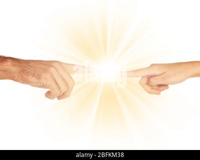 Women and men hand attracted to each other with light isolated on white Stock Photo