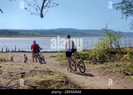 Bowling, Glasgow, Scotland, UK,18h April, 2020: UK Weather: Sunny day saw a busy Forth and Clyde canal at bowling on the firth of river clyde estuary. Stock Photo