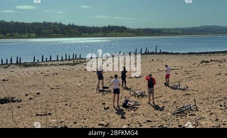 Bowling, Glasgow, Scotland, UK,18h April, 2020: UK Weather: Sunny day saw a busy Forth and Clyde canal at bowling on the firth of river clyde estuary. Stock Photo