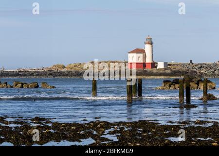 Coquille River Lighthouse in Bandon Oregon on a cloudy and foggy day typical of winter on the coast Stock Photo