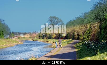 Bowling, Glasgow, Scotland, UK,18h April, 2020: UK Weather: Sunny day saw a busy Forth and Clyde canal at bowling on the firth of river clyde estuary. Stock Photo