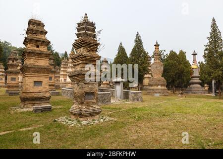 Dengfeng, China - October 17, 2018: Pagoda Forest at Shaolin Temple. The pagoda forest in Shaolin stands at the foot of Shaoshi Mountain. Stock Photo