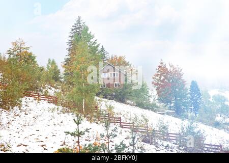 Landscape of village in mountains Stock Photo