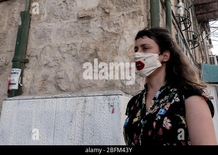 Jerusalem, Israel. 19th Apr, 2020. As an ease of the Coronavirus lockdown comes into effect allowing a wider range of businesses to open, so does a mandatory requirement to wear a face mask in public, punishable with a 200 ILS fine. 13,362 Israelis have been diagnosed with COVID-19. Death toll is 172. Credit: Nir Alon/Alamy Live News Stock Photo