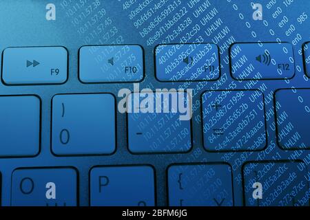 Computer keyboard with program code Stock Photo