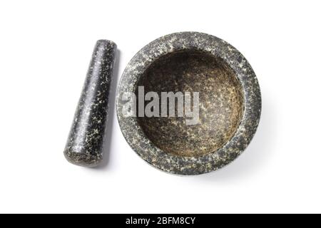Granite stone mortar and pestle isolated on white Stock Photo
