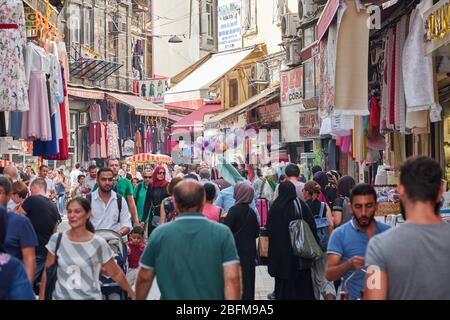 Istanbul, Turkey- September 20, 2017: Many citizens and tourists walking on a street in Istanbul full of typical shops Stock Photo