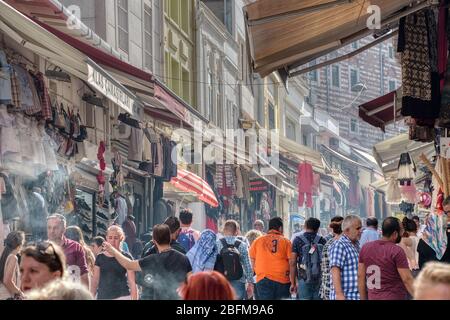 Istanbul, Turkey- September 20, 2017: Many citizens and tourists walking on a street in Istanbul full of typical shops Stock Photo