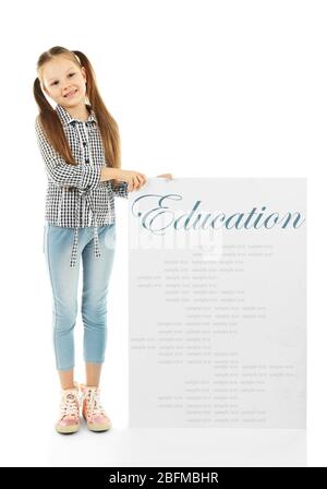 Cute school girl in causal with green blackboard for your text, isolated on white Stock Photo