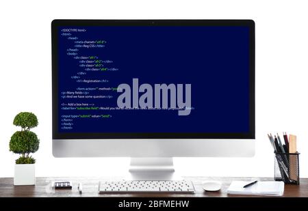 Programming code on computer monitor Stock Photo