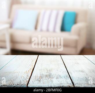Empty wooden table and blurred room interior background Stock Photo
