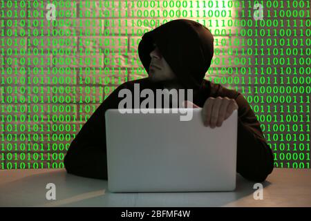 Hacker working with computer Stock Photo