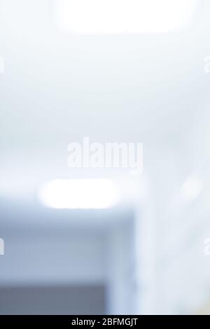 Blur medical clinic hospital interior. Hospital blurry background. Medical blurred background. Blured bokeh background. Stock Photo