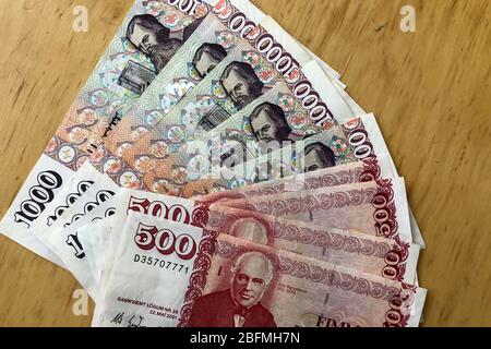 Icelandic cash. Money of Iceland. Several Icelandic krona bills on wooden table. Icelandic krona is the national currency of Iceland (kronur) Stock Photo