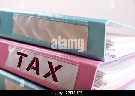 Tax label on business document folder, close up Stock Photo