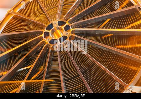 Metallic copper construction part of the circular mechanism Stock Photo