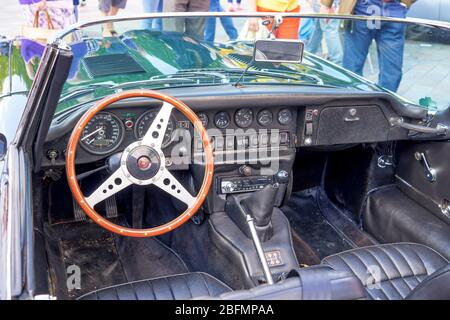 E type Jaguar convertible left hand drive steering wheel and dash panel Stock Photo