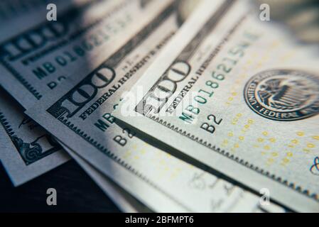 American cash dollars close-up. One Hundred Dollar Banknotes. Stock Photo