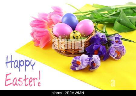 Easter greeting card. Multicoloured eggs and flowers on napkin Stock Photo