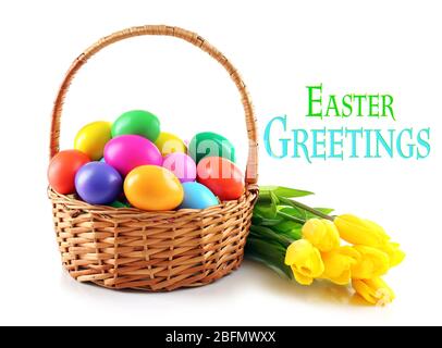 Easter greeting card. Multicoloured eggs in basket isolated on white Stock Photo