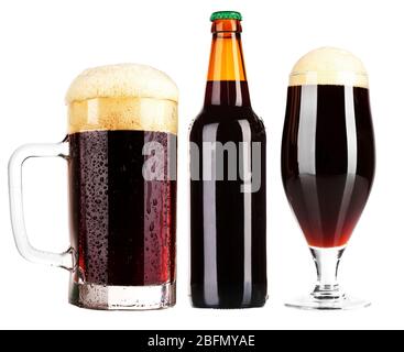 Different types of  dark beer in glass, mug and bottles, isolated on white Stock Photo