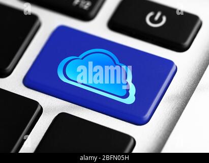 Cloud on computer keyboard. Cloud storage concept Stock Photo