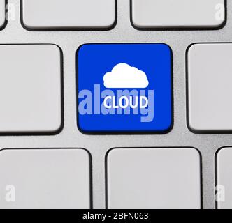 Cloud on computer keyboard. Cloud storage concept Stock Photo