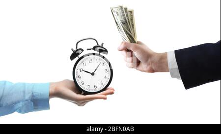 Time is money. Buying time. Hand with money and hand with alarm-clock ...