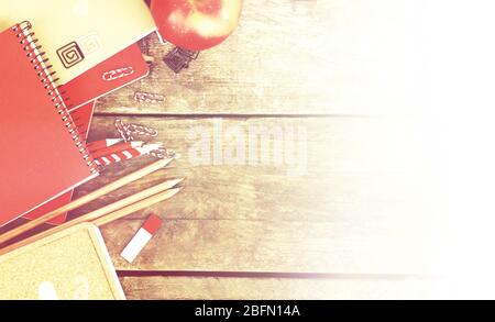 Bright school stationery on old wooden table Stock Photo