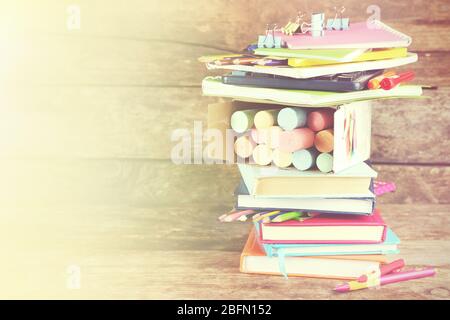 Bright school stationery on old wooden table Stock Photo