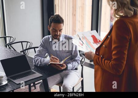Two colleagues working together in a studio Stock Photo