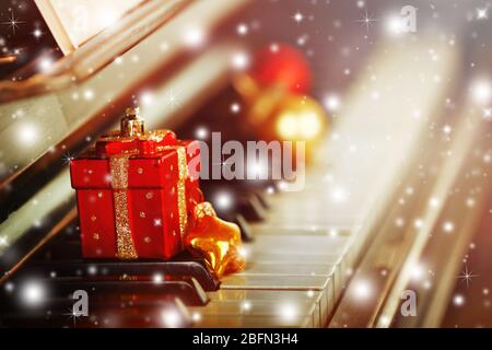 Piano keys decorated and Christmas decorations with snow effect Stock Photo