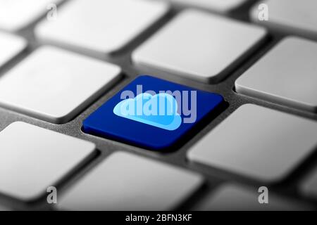 Cloud on computer keyboard. Cloud storage concept Stock Photo